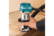 Кромочный фрезер Makita 710 Вт,10000-34000 об/м, цанга 6 и 8 мм, погружная и наклонная базы, копировальные втулки 10 и 16 мм, параллельный упор, сумка RT0702CX2