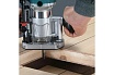 Кромочный фрезер Makita 710 Вт, 10000-34000 об/мин,цанга 6 и 8 мм, копировальная втулка 10 мм, параллельный упор, адаптер пылеудаления, ключи - 2 шт RT0702C
