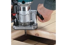 Кромочный фрезер Makita 710 Вт, 10000-34000 об/мин,цанга 6 и 8 мм, копировальная втулка 10 мм, параллельный упор, адаптер пылеудаления, ключи - 2 шт RT0702C
